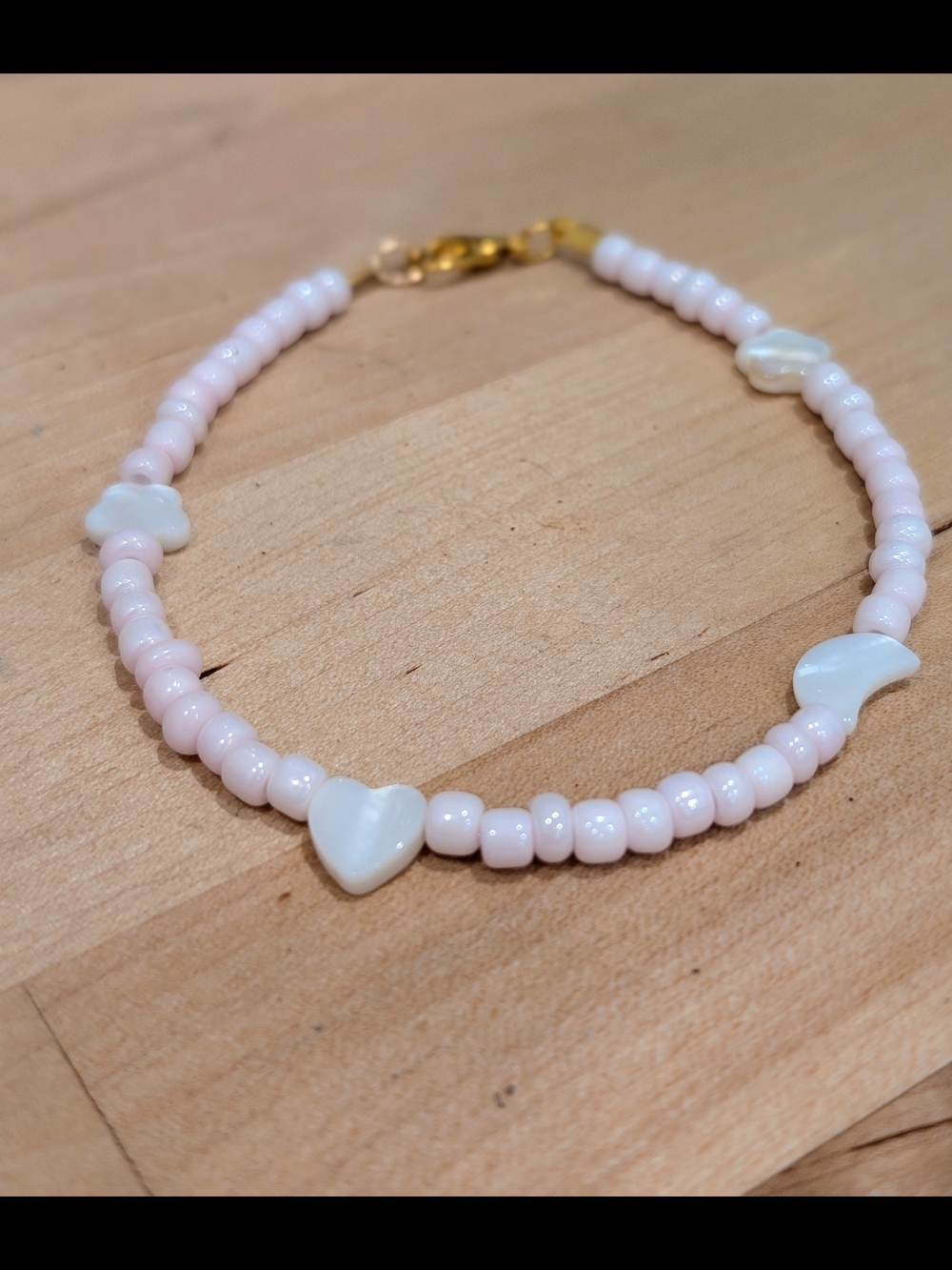 Delicate Pink Beaded Bracelet with Mother-of-Pearl Charms